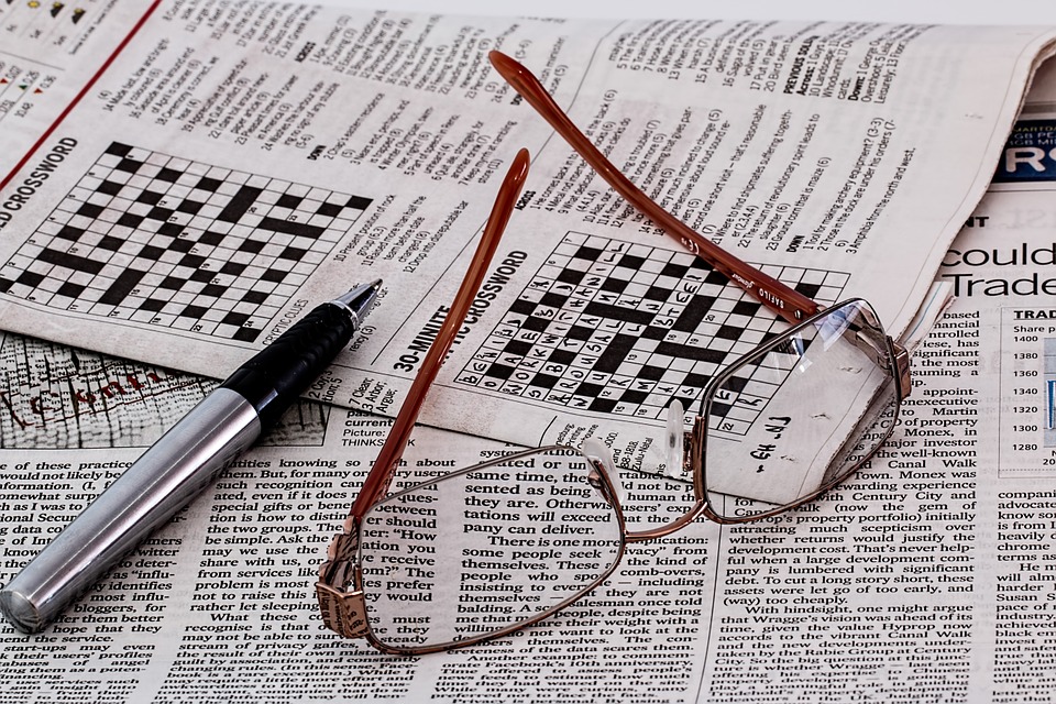Newspaper and Glasses